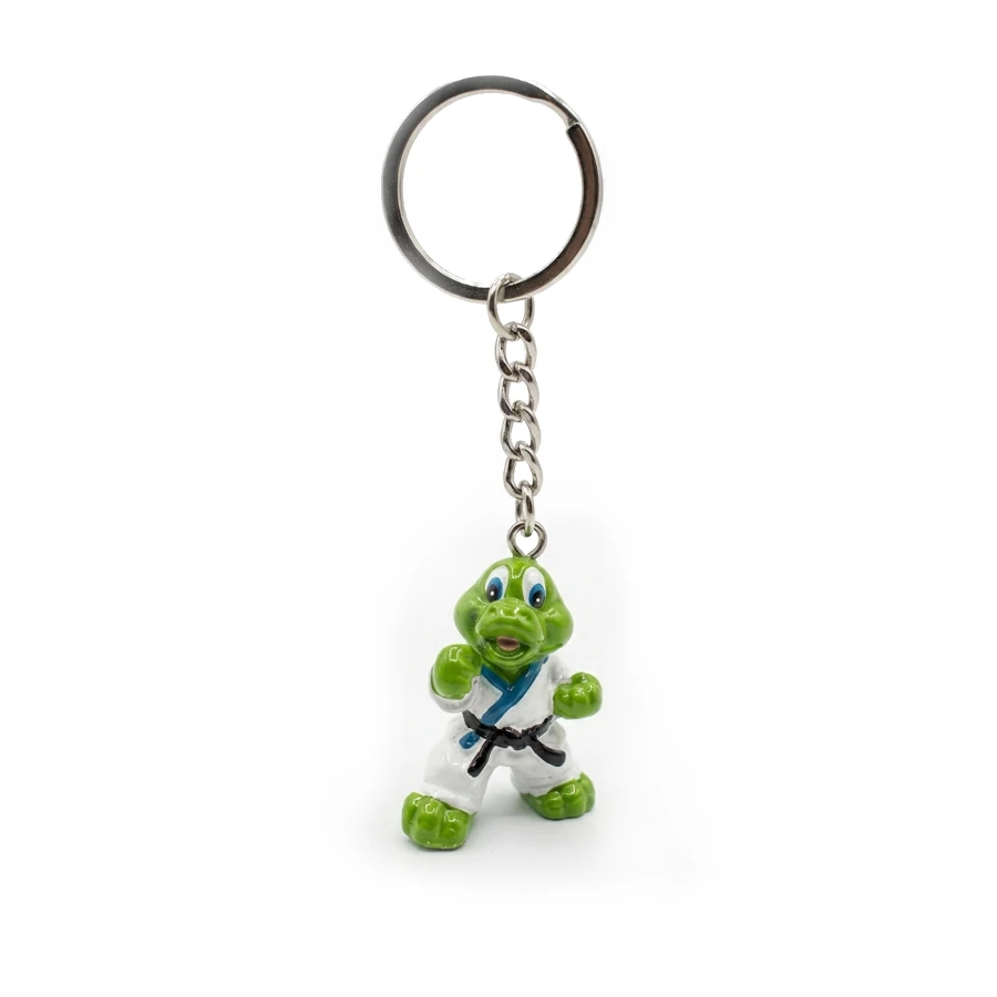 Green dragon keychain with a black belt on a white background