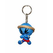 Royal blue plush muay thai keychain with a keyring on a white background