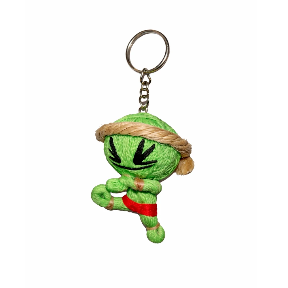 Green plush muay thai keychain with a keyring on a white background