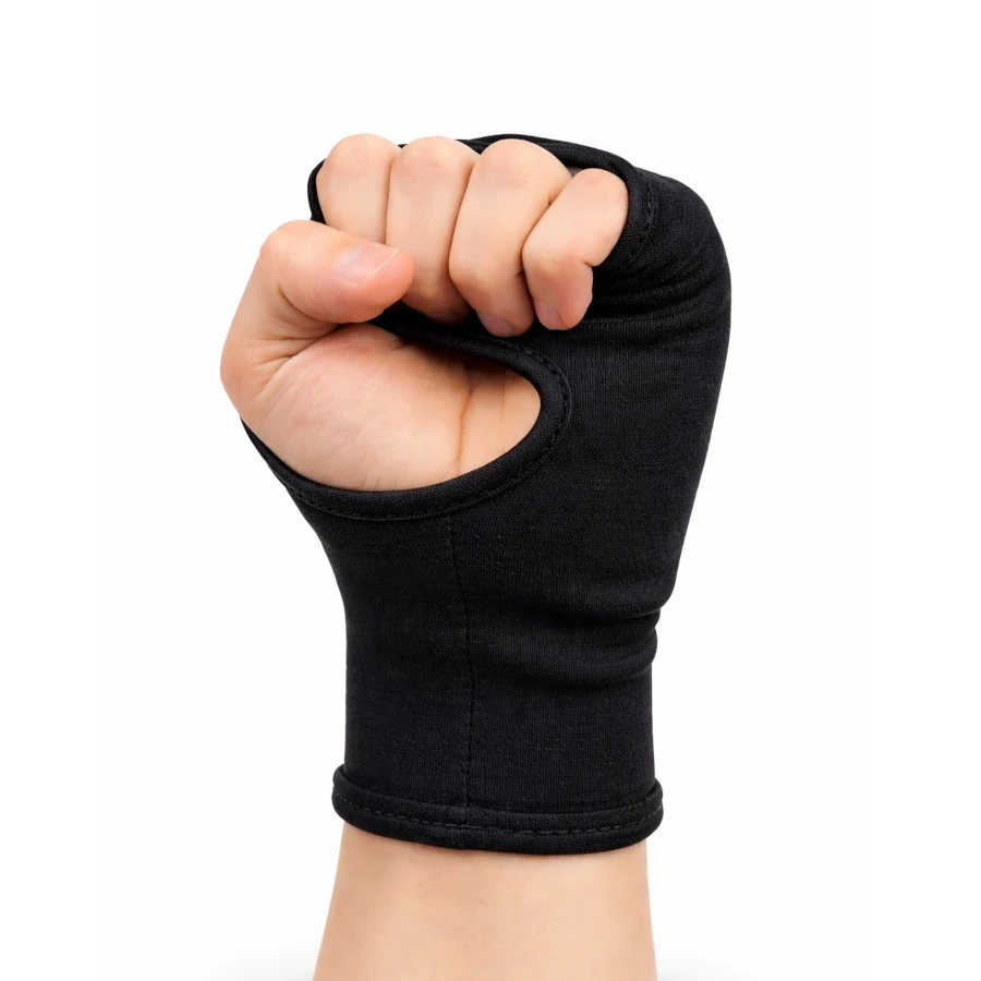 Hand wearing a black martial arts hand mitt on a white background