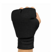 Black karate hand mitt on a white background