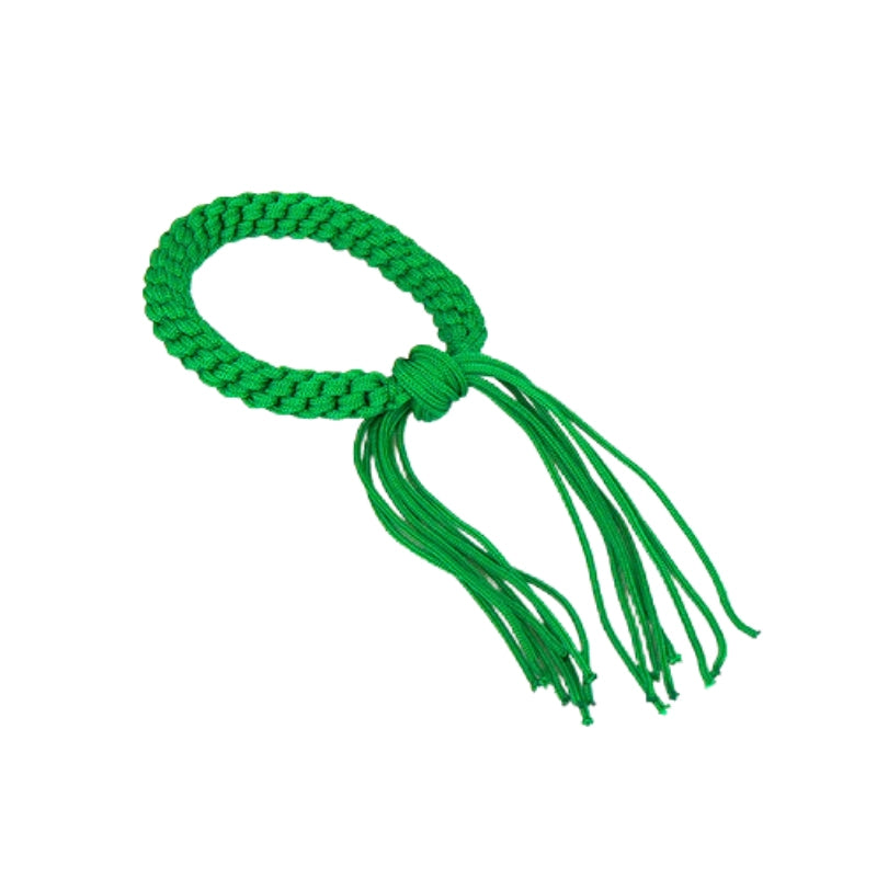 Green braided bracelet with tassels on a white background