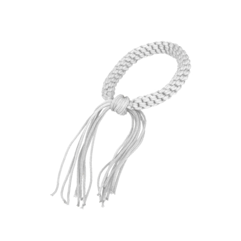 White braided bracelet with tassels on a white background