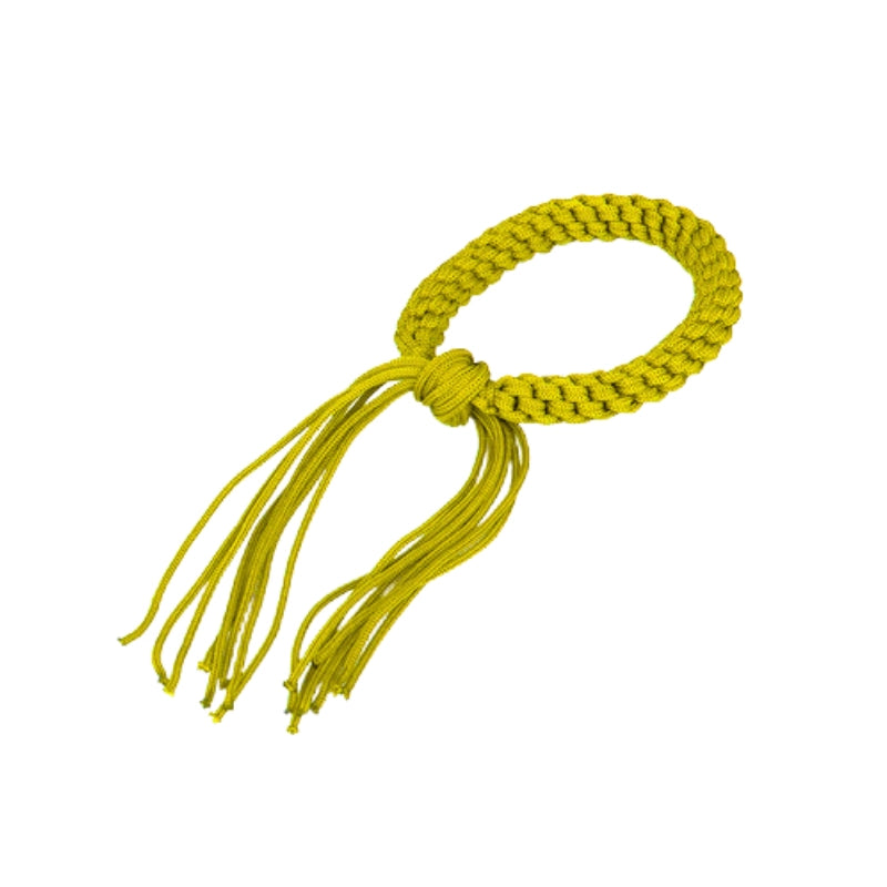 Yellow braided bracelet with tassels on a white background