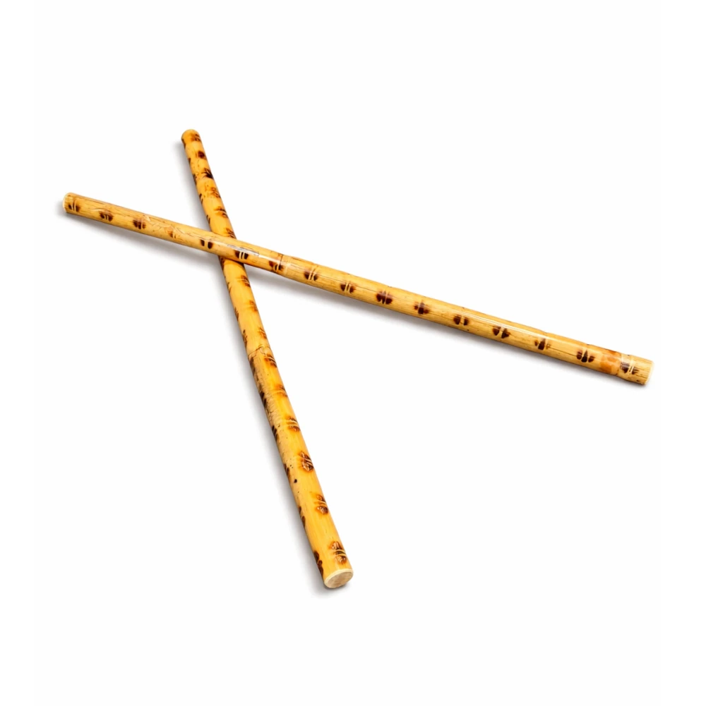 Two crossed rattan bamboo sticks on a white background