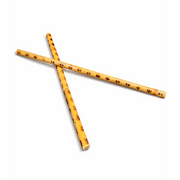 Two crossed rattan bamboo sticks on a white background