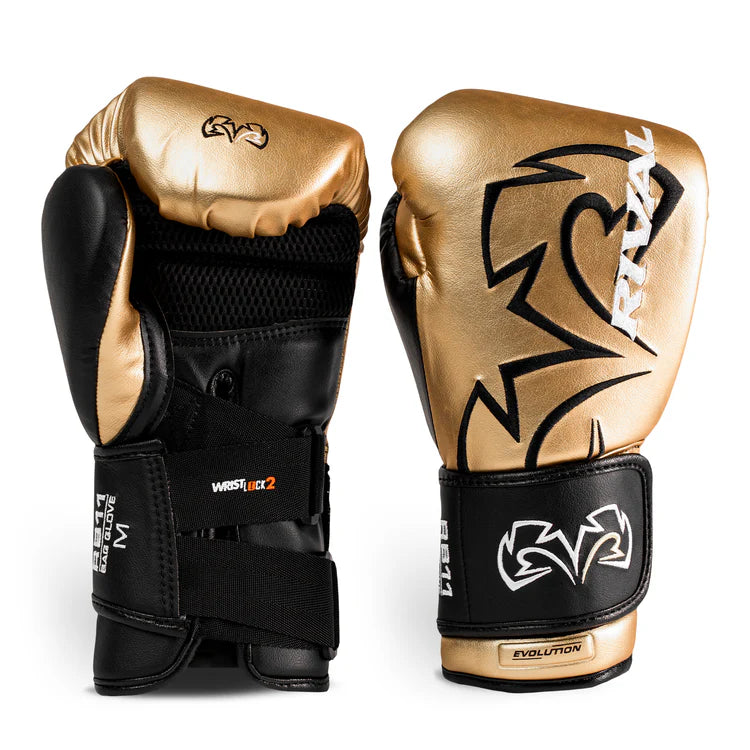 Pair of gold and black boxing gloves with a Rival logo on a white background