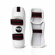 White elbow protectors with black and red accents on a white background, featuring the RFG logo.