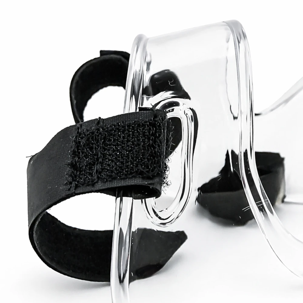 Black velcro with clear plastic face shield on a white background