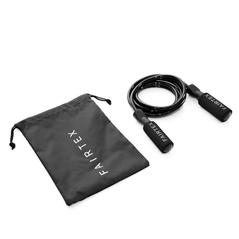 Black jump rope with Fairtex branding next to a black drawstring bag on a white background