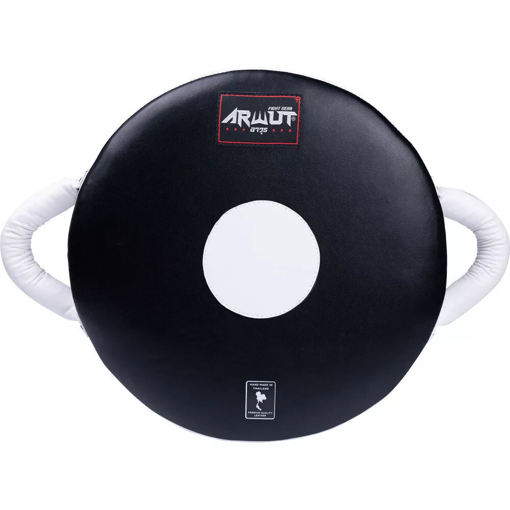 Black boxing pad with white center and white handles on a white background, featuring the Armut logo.
