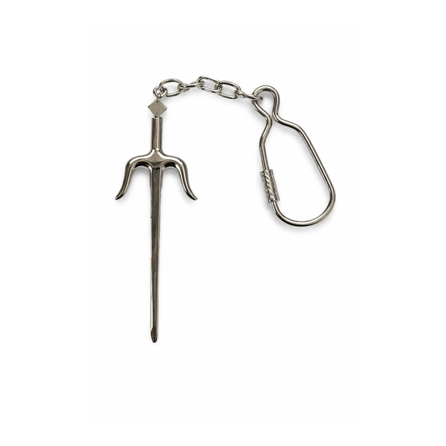 Metal keychain with a sai on a white background