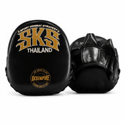 Black and gold boxing pads with 'SKS Thailand' branding on a white background