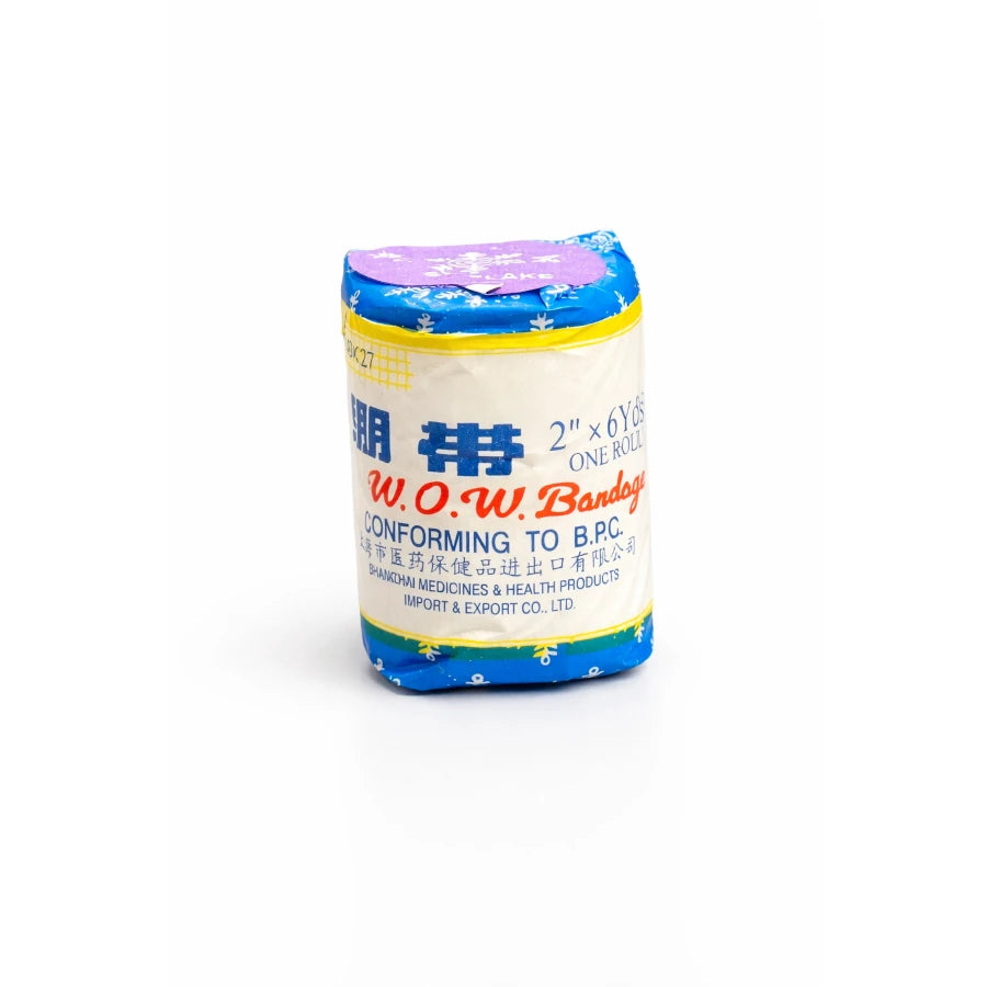 Roll of W.O.W. bandages with a colorful label on a white background