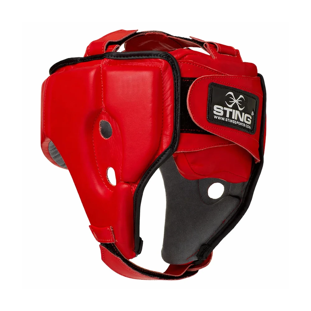 Red boxing headgear with black straps on a white background, featuring the Sting brand.