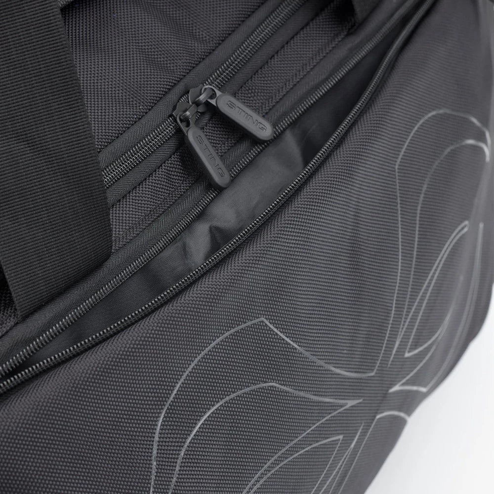 Close-up of a black and gray bag with zipper details