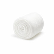 Rolled-up white gauze on a white background