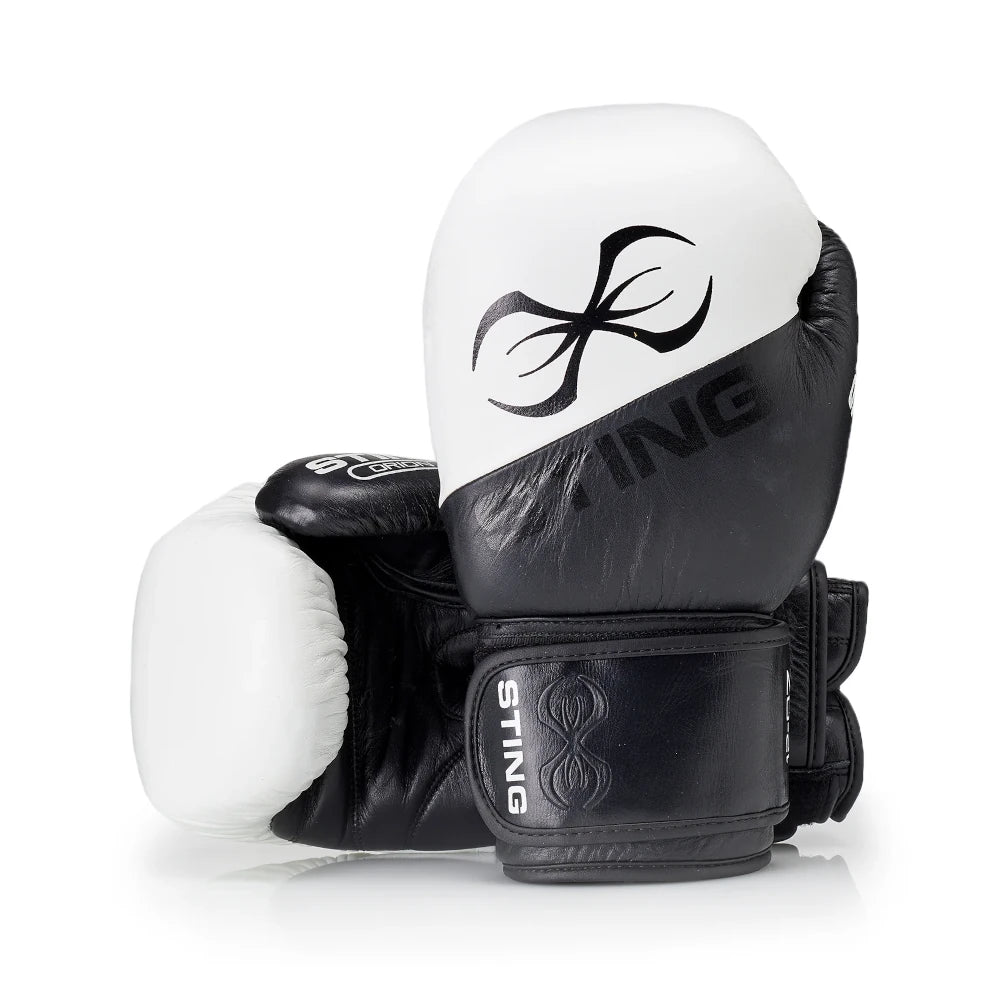 Black and white boxing gloves with Sting logo on a white background