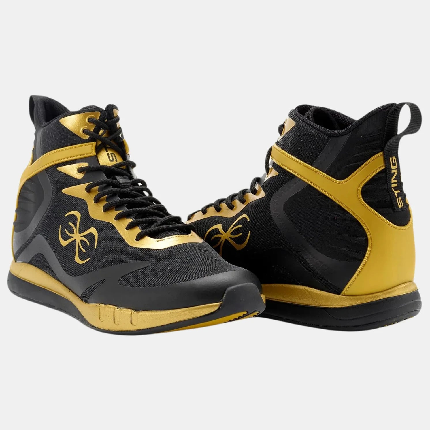 Black and gold high-top sneakers with a Sting Sports logo on a white background