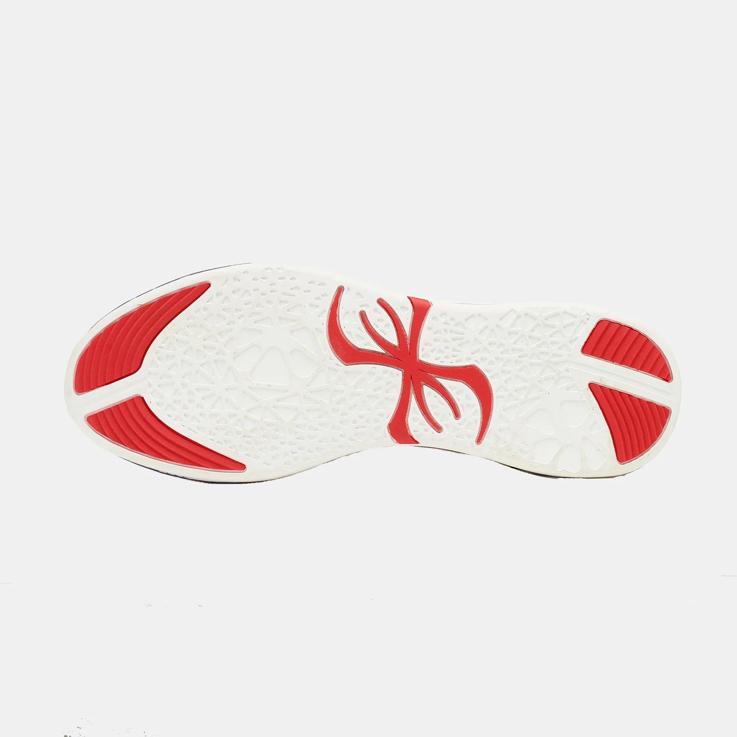 White sneaker with red accents on a light gray background