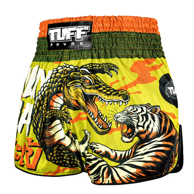 Muay Thai shorts with crocodile and tiger design on a yellow background, featuring TUFF brand.