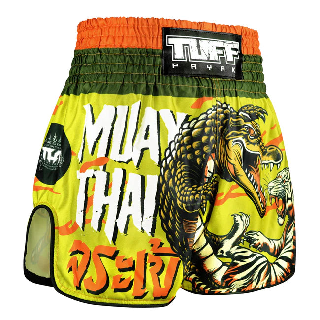 Muay Thai shorts with snake and tiger design on a yellow background, featuring TUFF PAYAK branding.