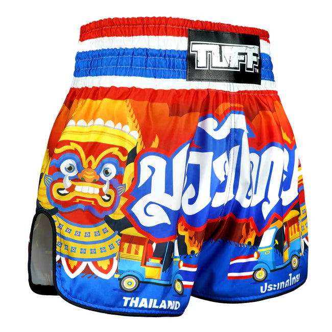 Colourful Muay Thai shorts with a traditional Thai design and 'TUFF' branding.