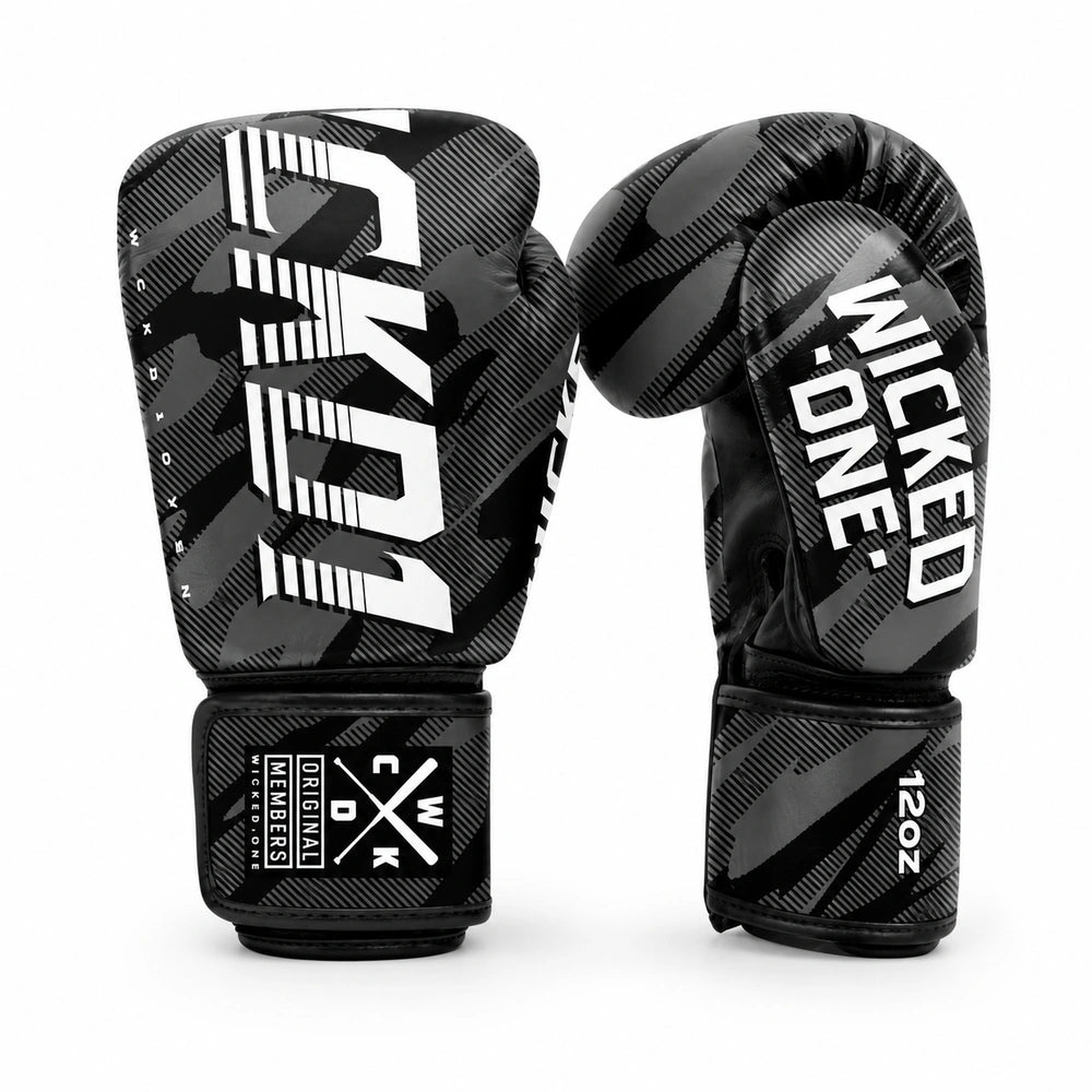 A pair of black and gray patterned boxing gloves with bold white branding, displayed against a clean white background.