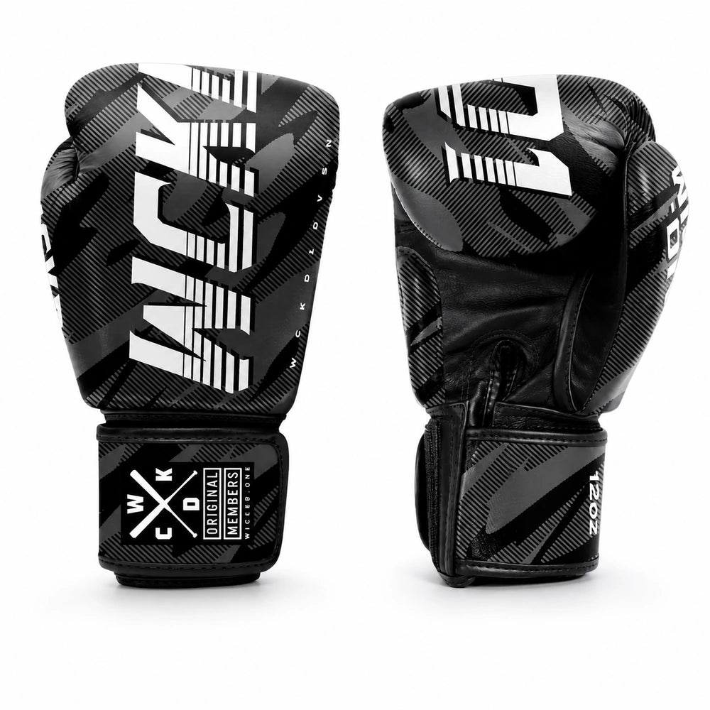 A pair of black and white boxing gloves with a textured pattern, featuring the brand name 'WCKD1' on one glove and '12oz' on the other, displayed against a clean white background.