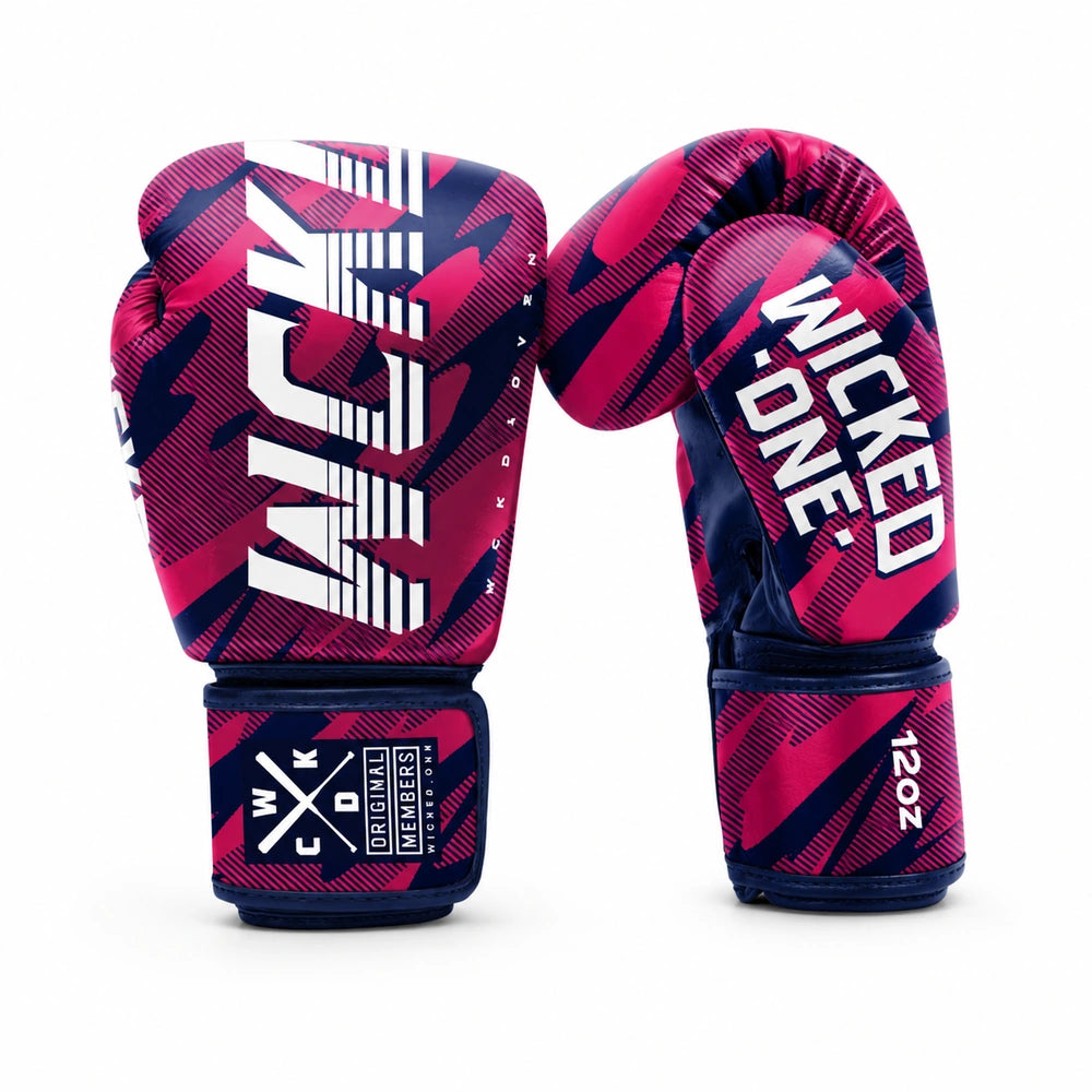 A pair of boxing gloves featuring a vibrant pink and navy blue geometric pattern, with bold white text reading 'WICKED ONE' and '12oz' on a clean white background.