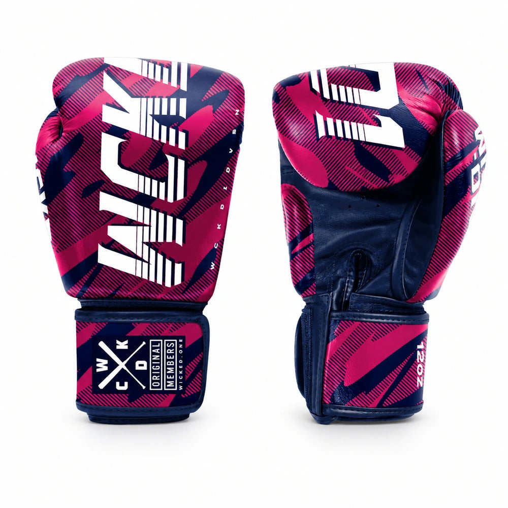 A pair of boxing gloves shown from the front and back on a clean white background. The gloves feature a bold pink and navy blue camouflage pattern with large white 'WCKD1' branding on the front glove and a 'WCKD BOXING' logo on the wrist strap.