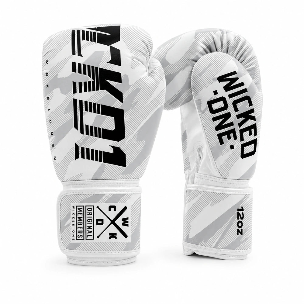 A pair of white and gray boxing gloves with black branding, shown against a plain white background. One glove displays the brand name 'WICKED' vertically in black, and the other shows the model '12oz' and a logo patch on the wrist strap.
