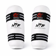 Pair of white arm guards with black straps and Wacoku branding on a white background