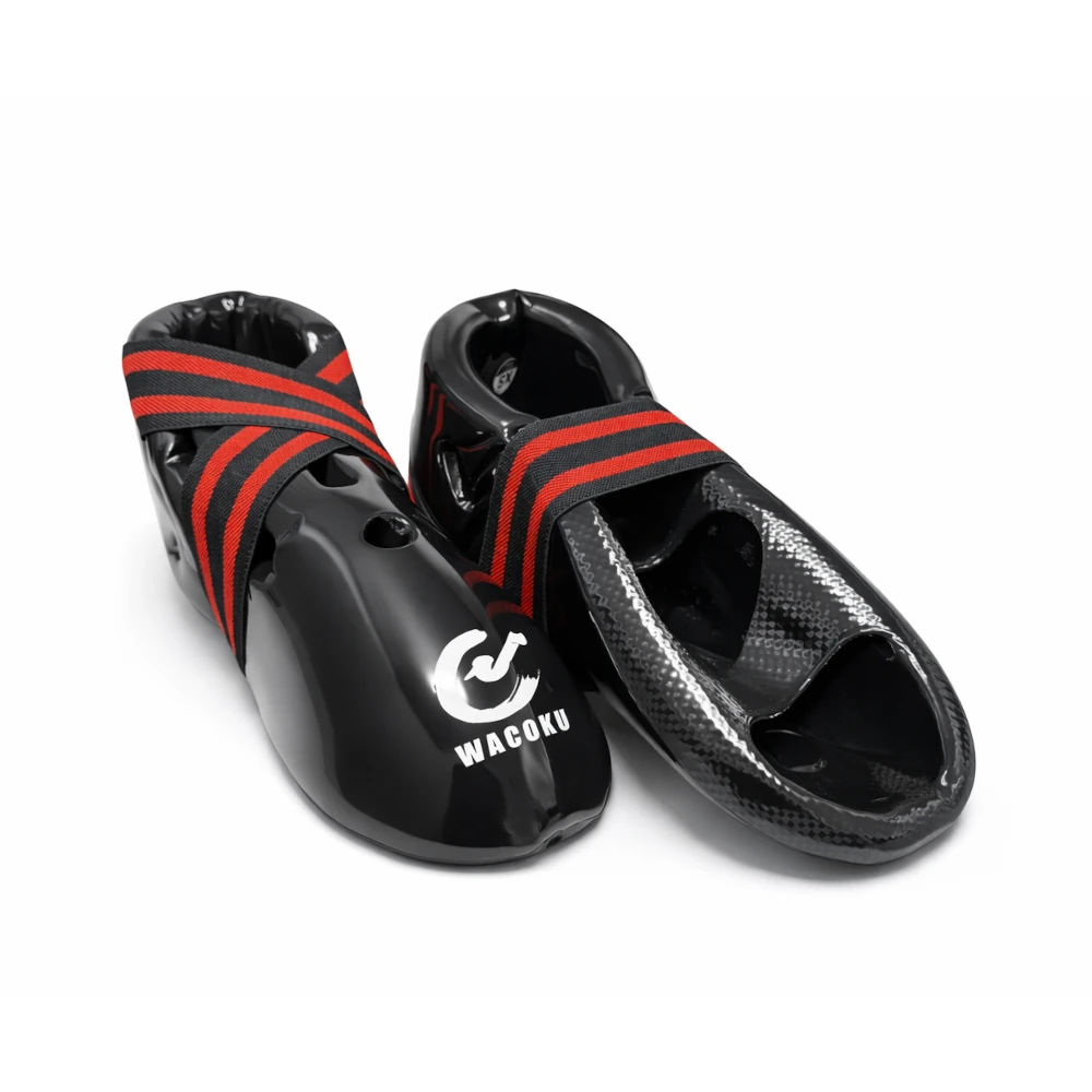 Black and red martial arts feet protectors with Wacoku logo on a white background