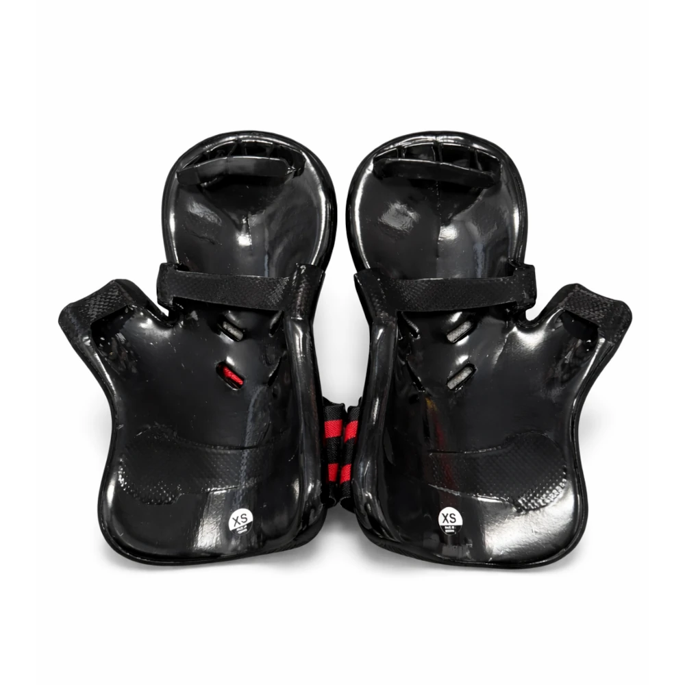 Black martial arts hand protectors with Wacoku logo on a white background