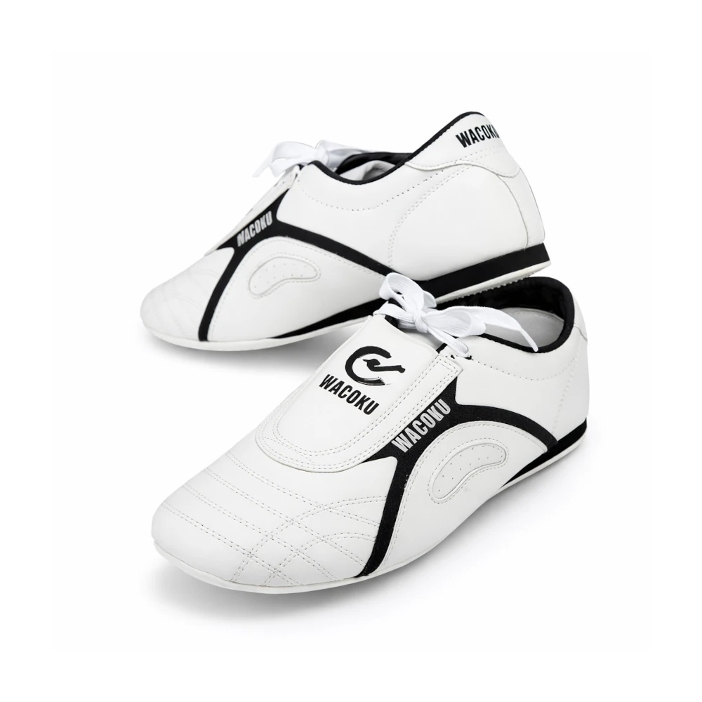 White martial arts sneakers with black accents and 'Wacoku' branding on a white background