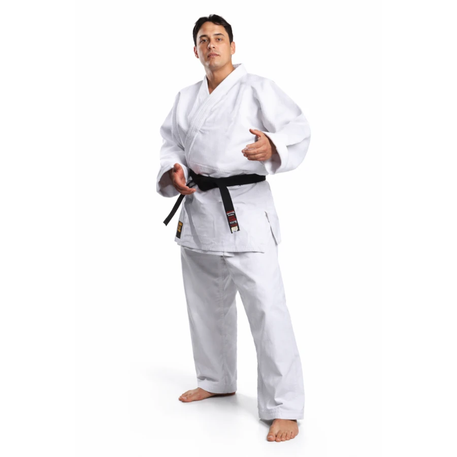 Male wearing a white martial arts uniform with a black belt on a white background