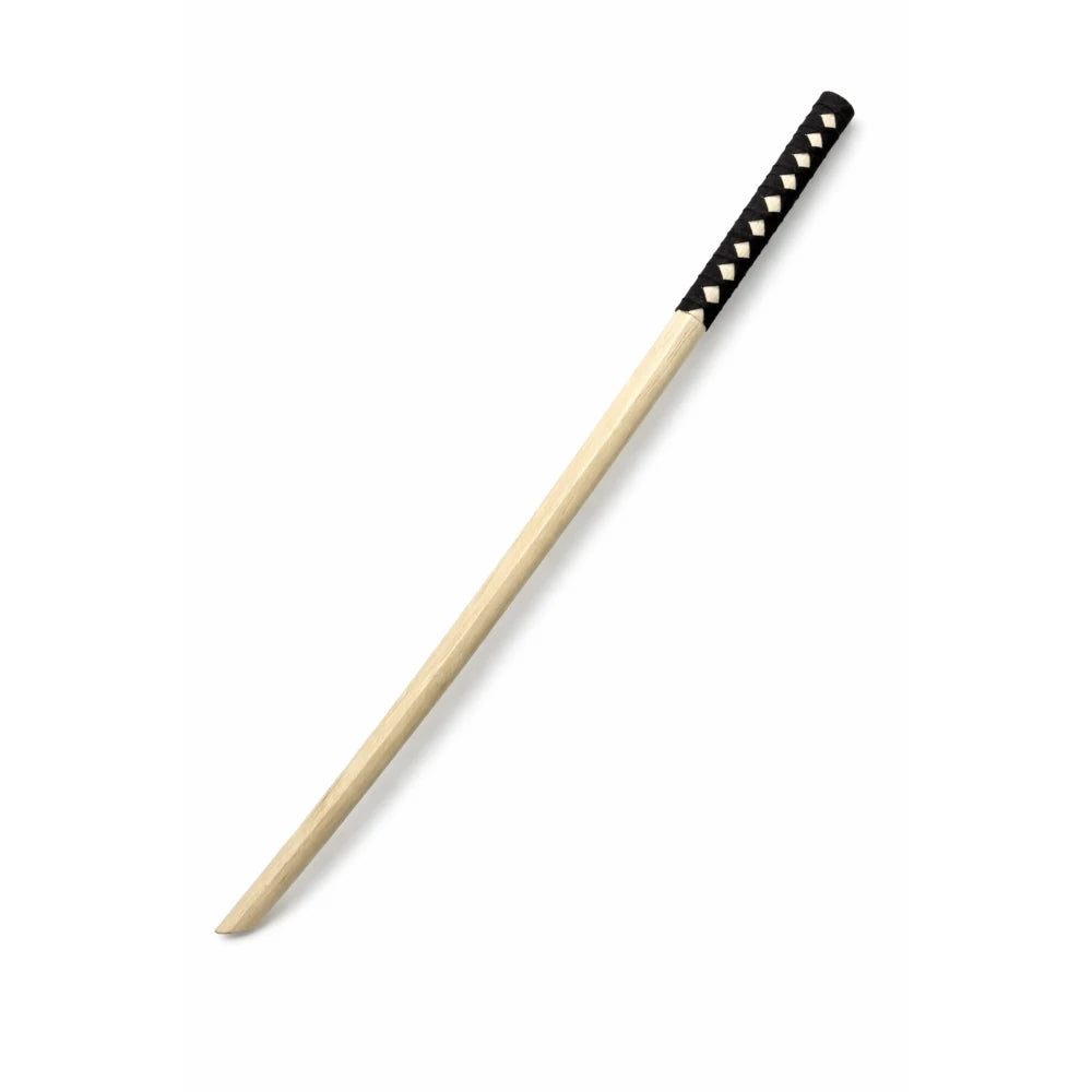 Wooden bokken/sword with black decorative handle on a white background